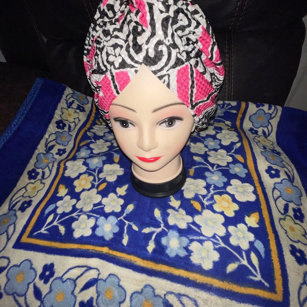 Gorgeous pink, black and white styled head scarf.